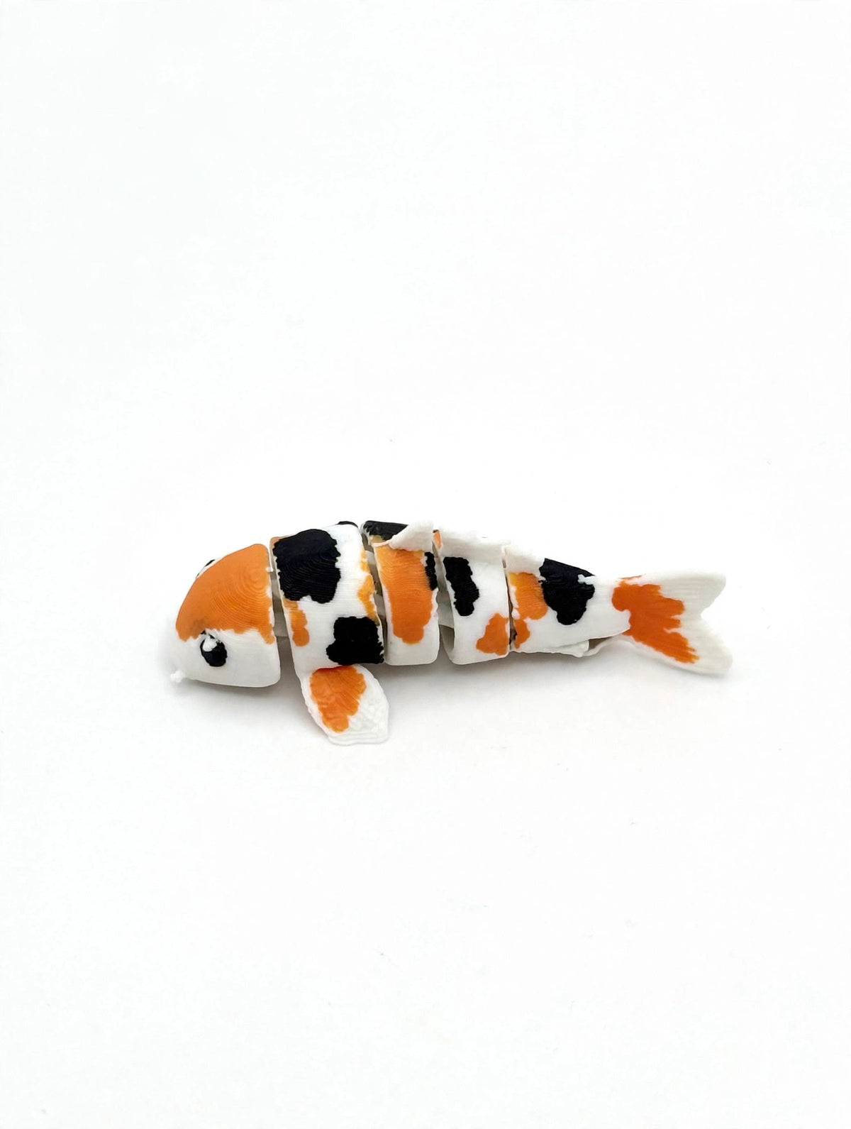 3D printed koi fish, white background