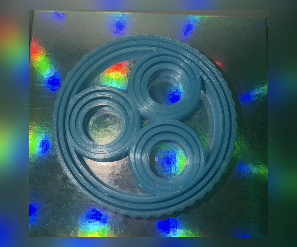 Rotating rings fidget toy in light blue, top view