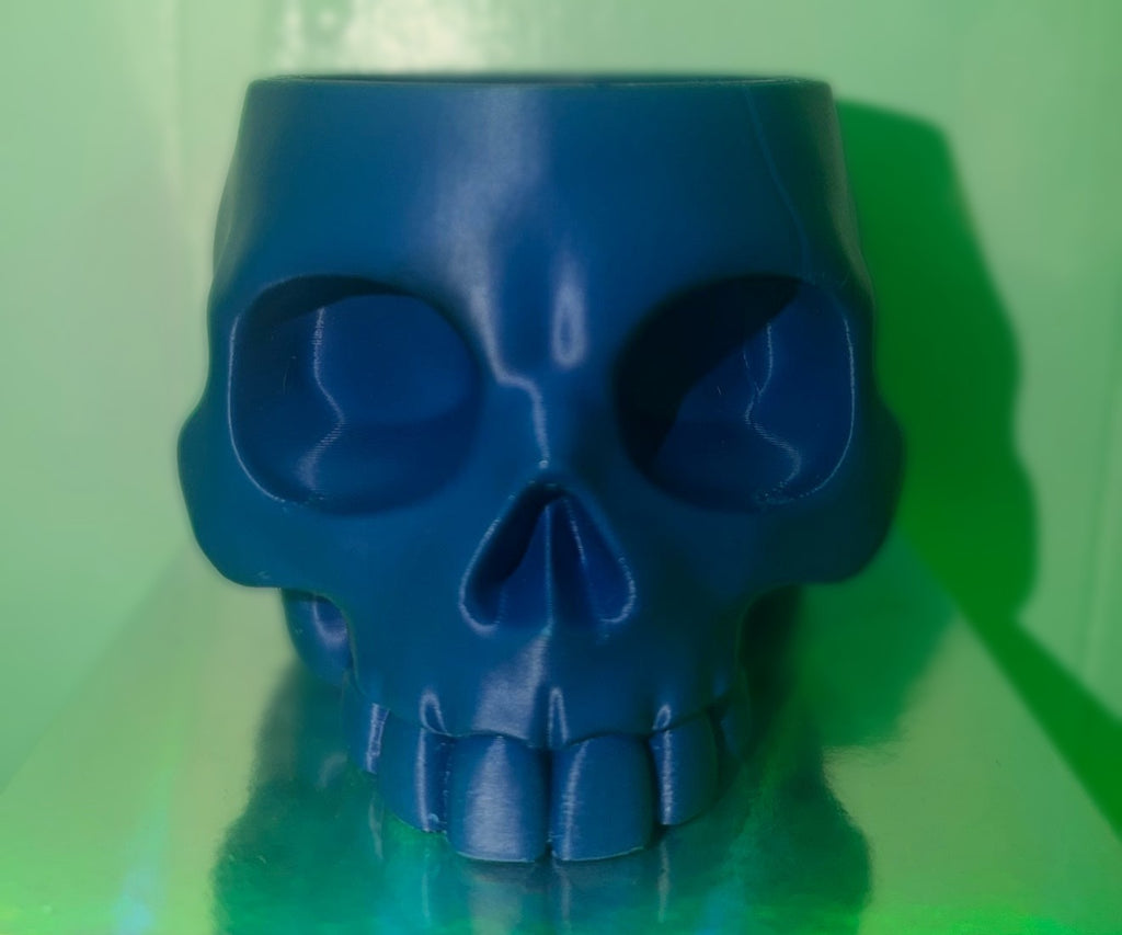 Blue 3D printed skull bowl, front view