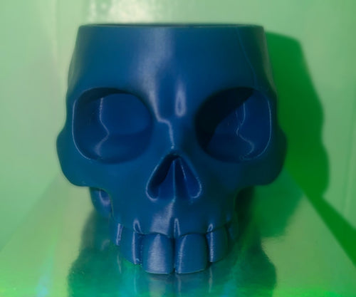 Blue 3D printed skull bowl, front view
